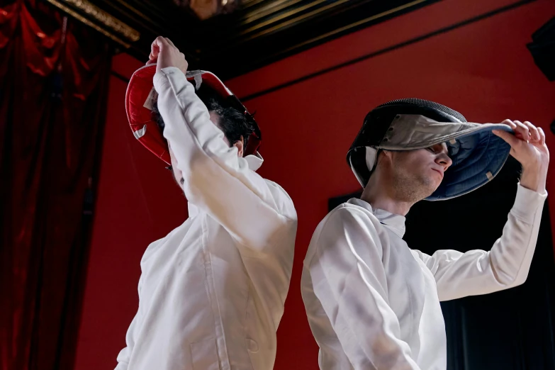 a couple of men standing next to each other on a stage, inspired by Horace Vernet, renaissance, fencing, immersive, helmet is off, press photos