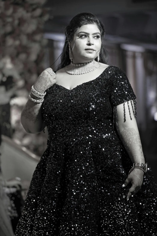 a black and white photo of a woman in a dress, sequins, bbwchan, high quality upload, formal wear