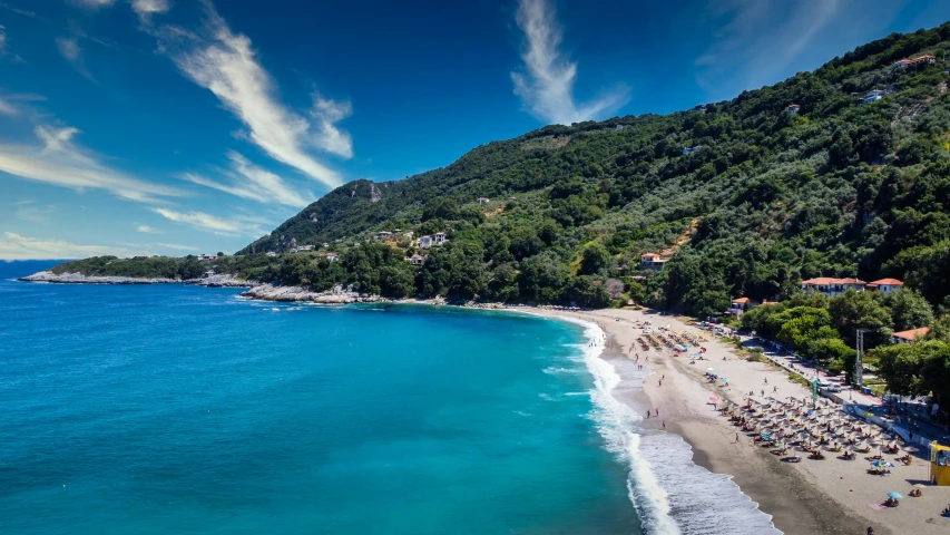 a beach filled with lots of umbrellas next to the ocean, by Julian Allen, pexels contest winner, renaissance, picton blue, in a mediterranean lanscape, bizzaro, a wooden