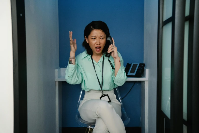 a woman sitting on a toilet talking on a phone, inspired by helen huang, pexels contest winner, hyperrealism, shocked expression, in an office, mai anh tran, stood in a cell