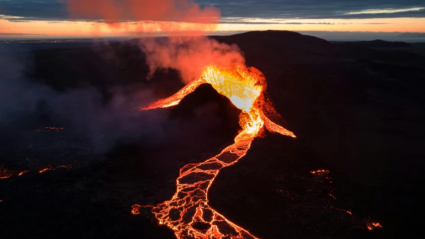 an aerial view of lava flowing into the ocean, pexels contest winner, hurufiyya, reflecting an erupting volcano, an ice volcano, “ aerial view of a mountain, the gate to hell