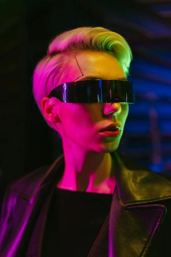 a woman wearing a leather jacket and sunglasses, cyberpunk art, inspired by David LaChapelle, trending on pexels, futurism, glowing oled visor, androgynous male, futuristic fashion show, non binary model