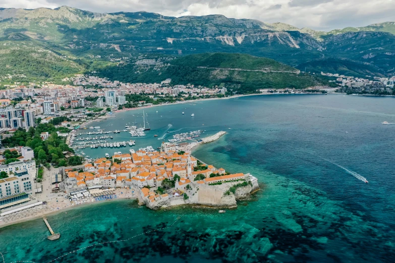 a small town in the middle of a large body of water, by Emma Andijewska, pexels contest winner, renaissance, croatian coastline, “ aerial view of a mountain, thumbnail, square