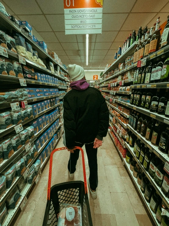 a woman pushing a shopping cart down a supermarket aisle, an album cover, inspired by Elsa Bleda, hyperrealism, gen z, holding beer bottles, profile image, about to step on you