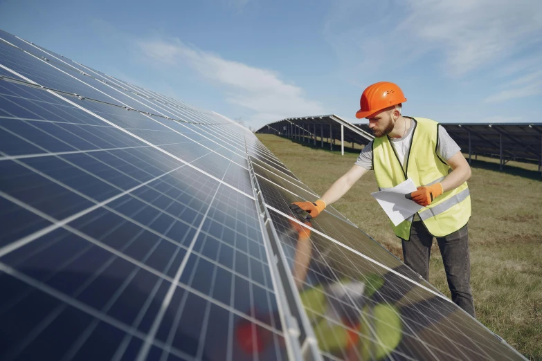 a man working on a solar panel in a field, pexels contest winner, 🦩🪐🐞👩🏻🦳, 2263539546], people at work, hyper realistic