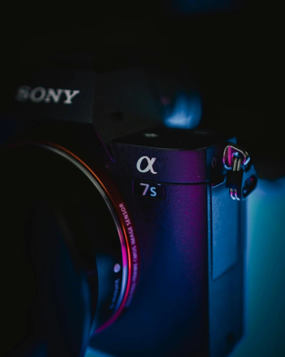 a sony camera sitting on top of a table, by Adam Marczyński, colourful close up shot, low quality photo, ray tracing x, posing for a picture