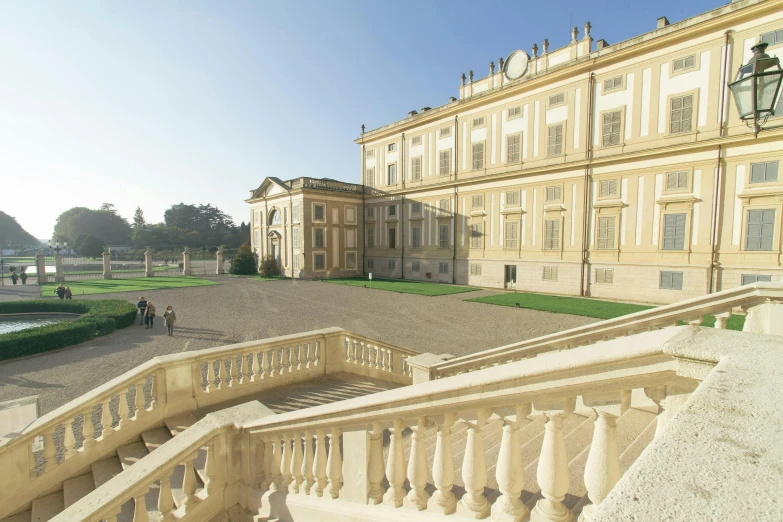 a large building with a lot of stairs in front of it, inspired by Mirabello Cavalori, neoclassicism, slide show, hazy, castle, brown