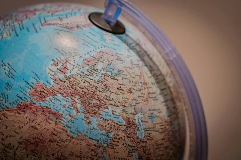 a close up of a globe on a table