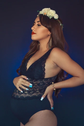 a woman in a black bodysuit with a flower in her hair, an album cover, trending on pexels, happening, alone gorgeous latin woman, blue corset, 15081959 21121991 01012000 4k, dressed in a lacy