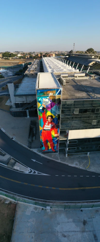 a view of an airport from a bird's eye view, by Okuda Gensō, pexels contest winner, street art, portrait of tall, billboard image, full building, photo on iphone