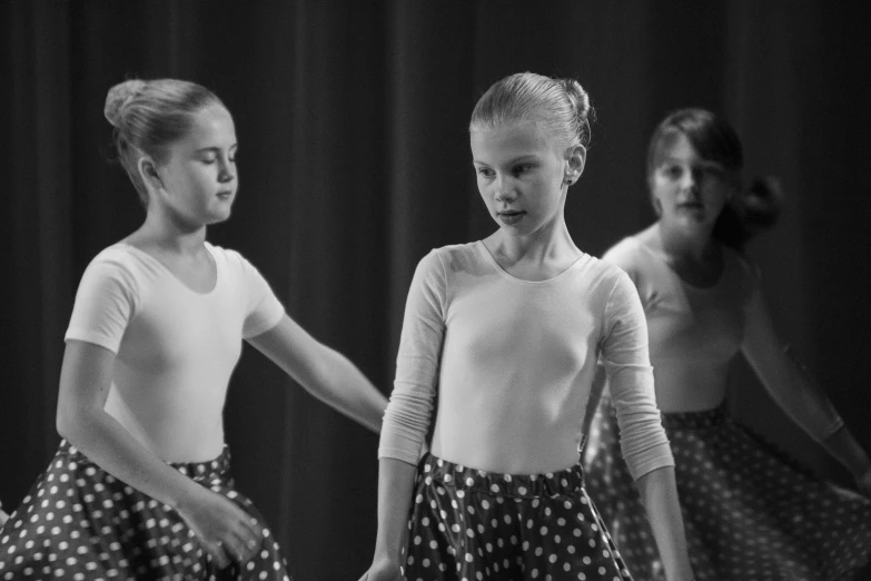 a group of young girls standing next to each other, a black and white photo, by Jan Rustem, pixabay, figuration libre, performing on stage, polka dot, portrait of a ballerina, 15081959 21121991 01012000 4k