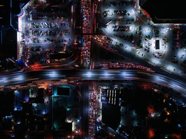 an aerial view of a city at night, unsplash contest winner, conceptual art, jeddah city street, parking lot, hyperrealistic”, square