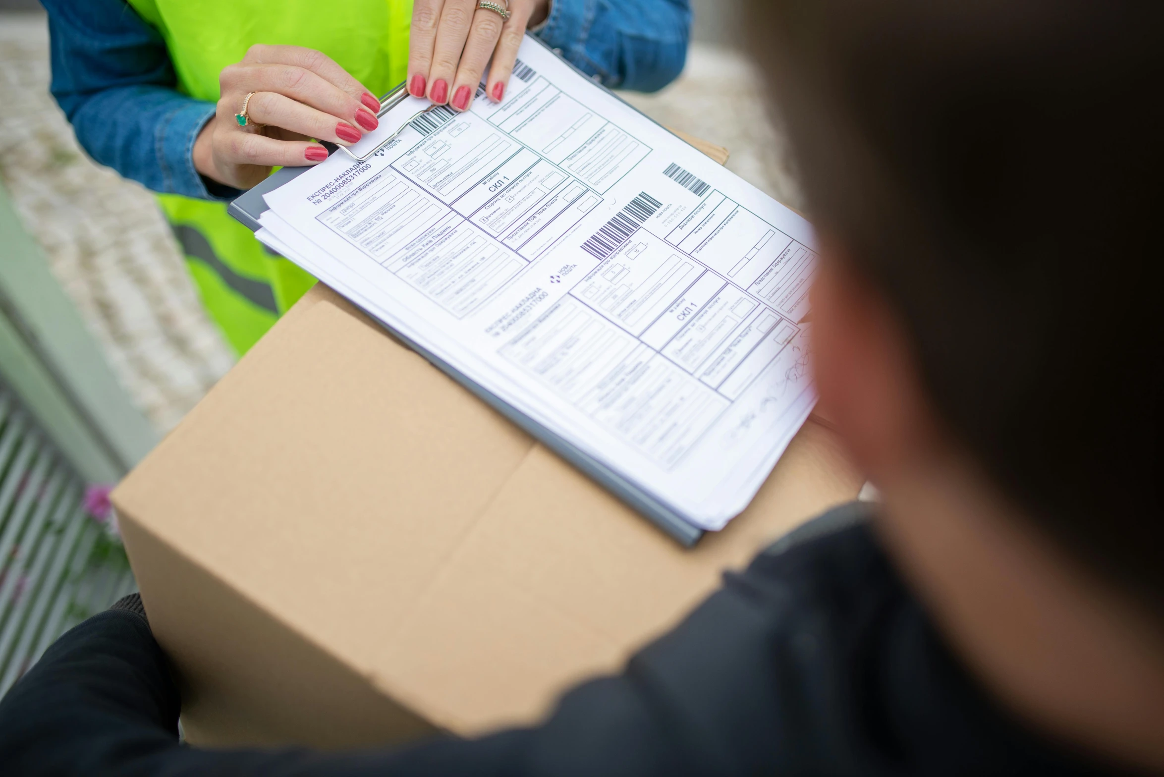 a close up of a person holding a box, private press, official documentation, thumbnail, brown, customer