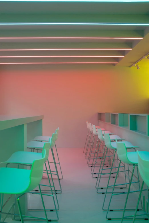 a bunch of chairs that are in a room, a digital rendering, trending on unsplash, conceptual art, bright fluorescent lights, turquoise pink and green, empty stools, fzd school of design