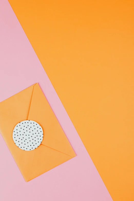 an orange envelope sitting on top of a pink and orange surface, trending on unsplash, dots abstract, modern pastel colours, greeting card, overview