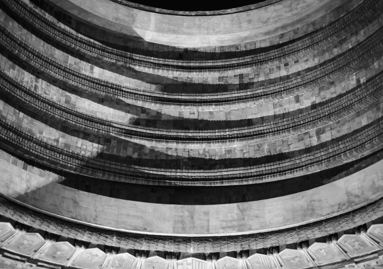 a black and white photo of the inside of a building, by Andor Basch, india, clear curvy details, pantheon, lined in cotton