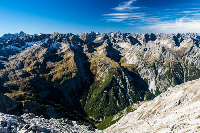 a group of people standing on top of a mountain, by Sebastian Spreng, pexels contest winner, hurufiyya, panoramic view, slovakia, avatar image