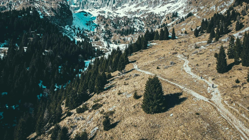 a view of a mountain with a lake in the distance, a tilt shift photo, by Matthias Weischer, pexels contest winner, les nabis, rocky ground with a dirt path, spruce trees on the sides, high quality product image”, “ aerial view of a mountain