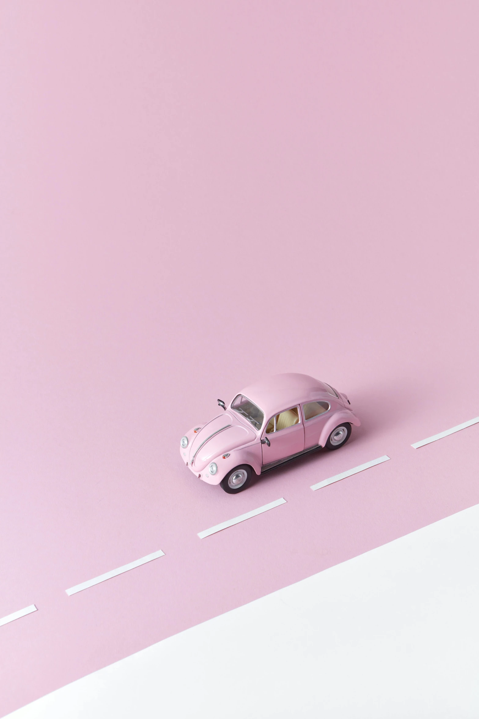 a pink toy car sitting on top of a road, by Cornelisz Hendriksz Vroom, unsplash contest winner, postminimalism, beetles, white hue, 15081959 21121991 01012000 4k, ilustration