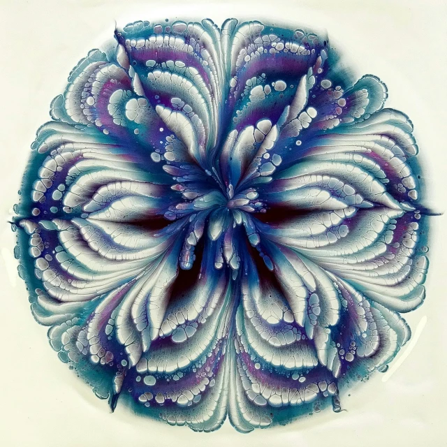 a close up of a flower on a plate, inspired by Ernst Haeckel, generative art, blue and purple vapor, painted with colour on white, freeform ferrofluids, judy chicago