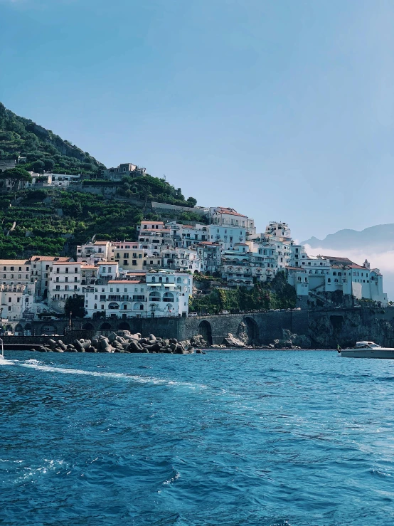 a large body of water filled with lots of buildings, renaissance, capri coast, profile image, cinematic shot, 🚿🗝📝
