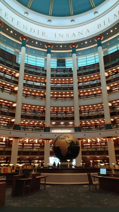 a large library filled with lots of books, by Bernardino Mei, rotunda, kuala lumpur, 💣 💥, high quality photo