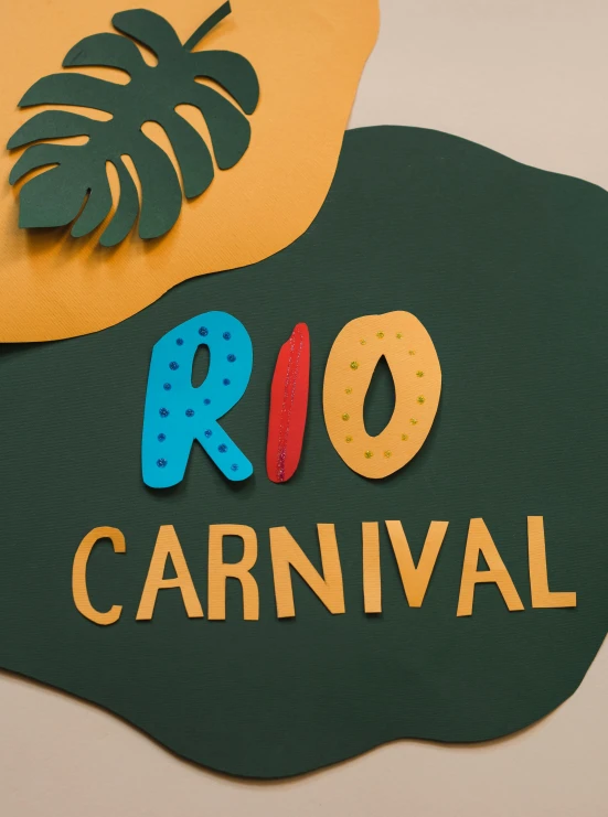 a close up of a sign that says rio carnival, by Julia Pishtar, cardstock, tearaway, thumbnail, flat lay