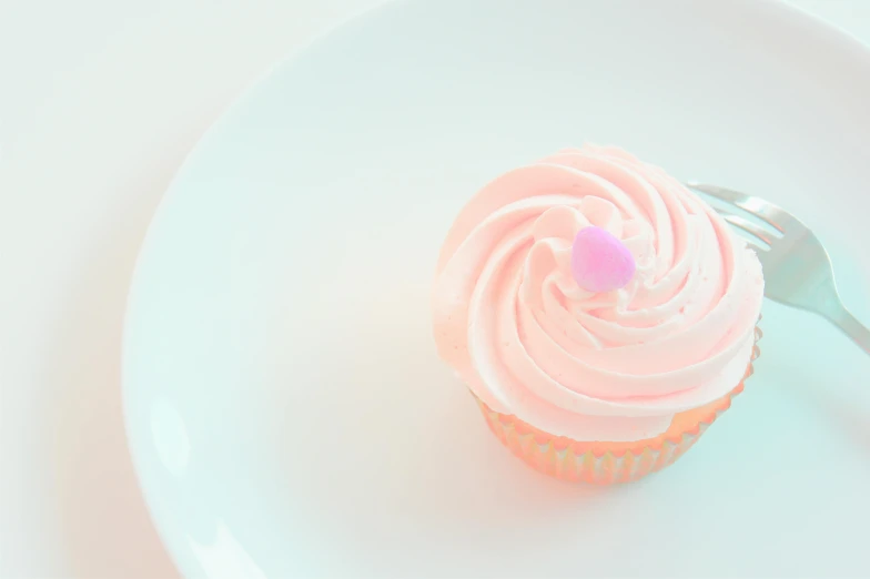 a cupcake sitting on top of a white plate, pexels, ((pink)), sherbert sky, high angle close up shot, feature