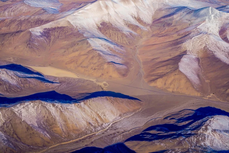 an aerial view of a mountain range in the desert, an ultrafine detailed painting, by Peter Churcher, pexels contest winner, tibet, high polygon, fan favorite, chile