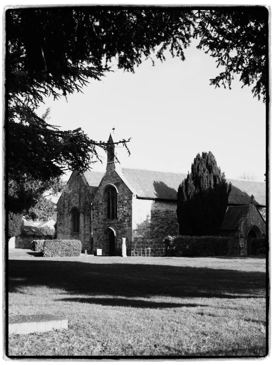 a black and white photo of a church, by Kev Walker, 1981 photograph, detailed medium format photo, dappled in evening light, 2006 photograph