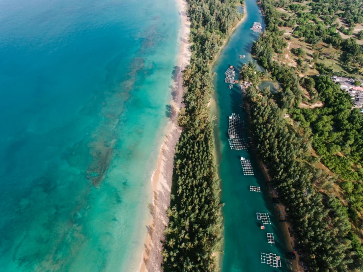 a large body of water next to a beach, pexels contest winner, hurufiyya, inlets, indonesia, flat lay, twice