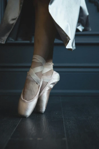 a close up of a person's feet in ballet shoes, shutterstock, arabesque, square, paul barson, tall, diy