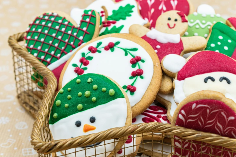 a basket filled with christmas cookies on top of a table, by Sylvia Wishart, pexels, naive art, red and green, closeup of an adorable, easy to use, thumbnail