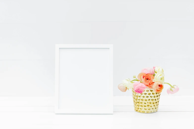 a vase filled with flowers next to a picture frame, a picture, pexels, background image, white with gold accents, square pictureframes, empty background