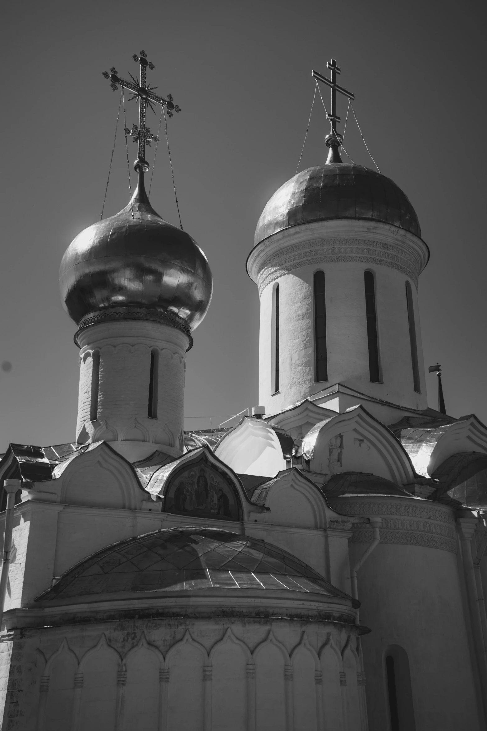 a black and white photo of a church, a black and white photo, by Vassily Maximov, domes, medium format. soft light, red square, two suns