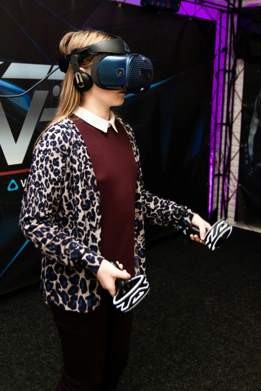 a woman standing in front of a tv wearing a virtual reality headset, in-game, outfit photograph, 2 5 6 x 2 5 6 pixels, hexadome