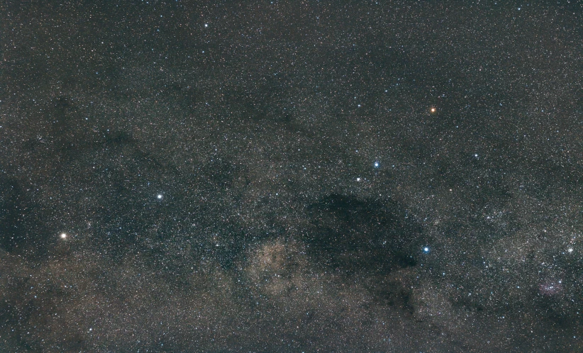 a dark sky filled with lots of stars, by Juergen von Huendeberg, neck zoomed in, dust clouds, 2 4 mm iso 8 0 0 color, wide long view