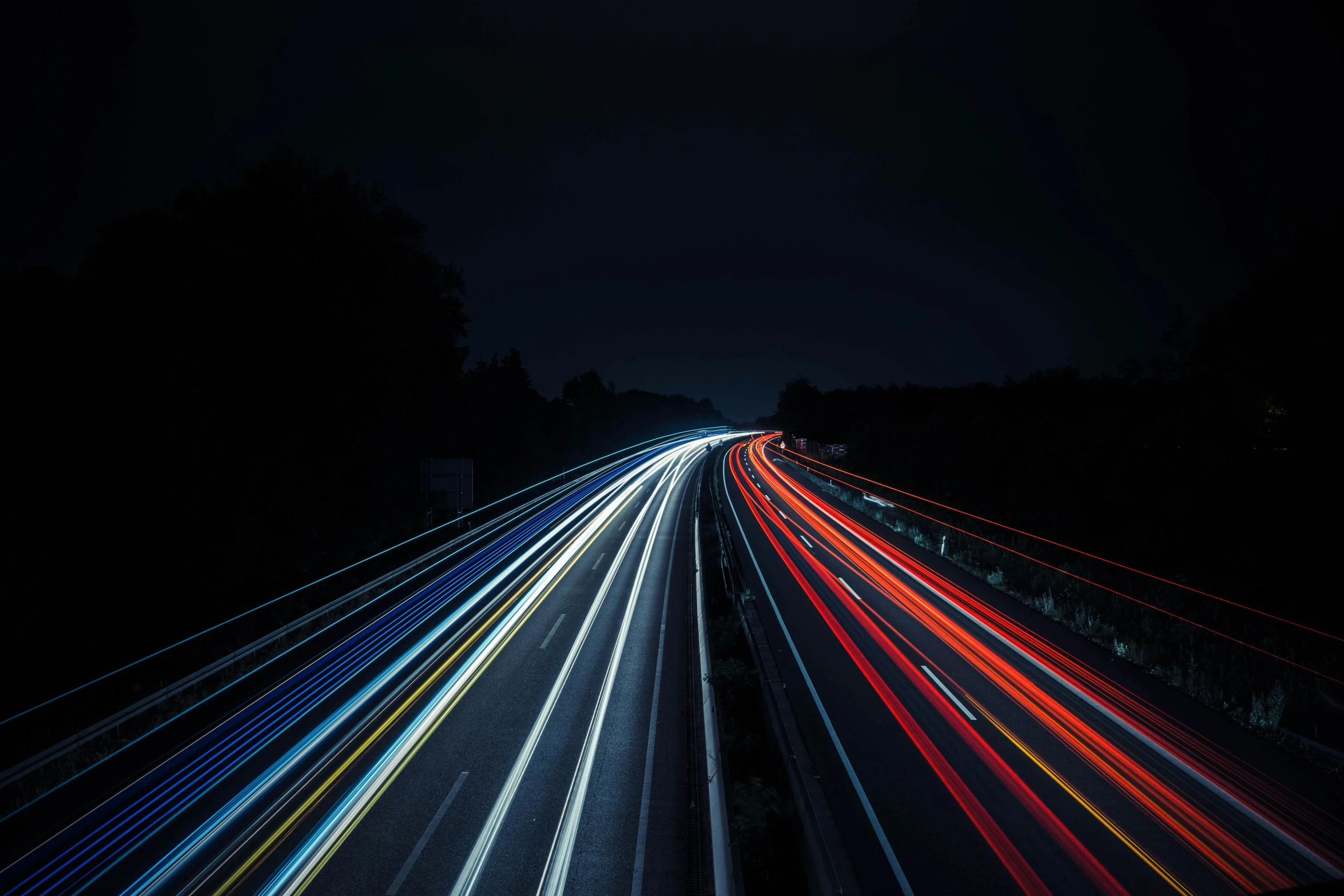 a long exposure photograph of a highway at night, by Sebastian Spreng, visual art, paul barson, high quality upload, tail lights, multicoloured