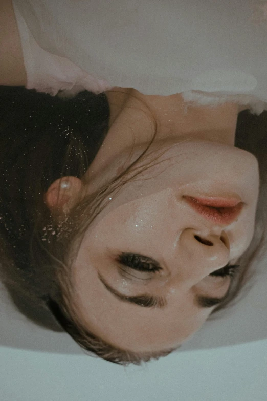 a close up of a person in a bath tub, a photorealistic painting, inspired by Yanjun Cheng, trending on pexels, clear cute face, upside down, korean girl, bubbly