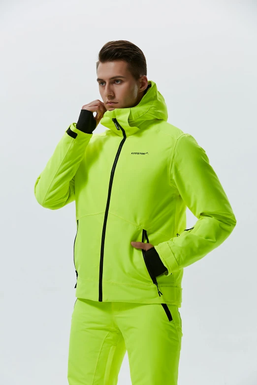 a man in a yellow ski suit talking on a cell phone, inspired by Salomon van Abbé, lime green, short jacket, cybertech wear, detailed product image