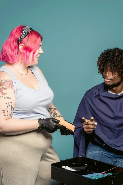 a man getting his hair cut by a woman, by Meredith Dillman, trending on pexels, renaissance, non binary model, holding arms on holsters, plus-sized, studio photo