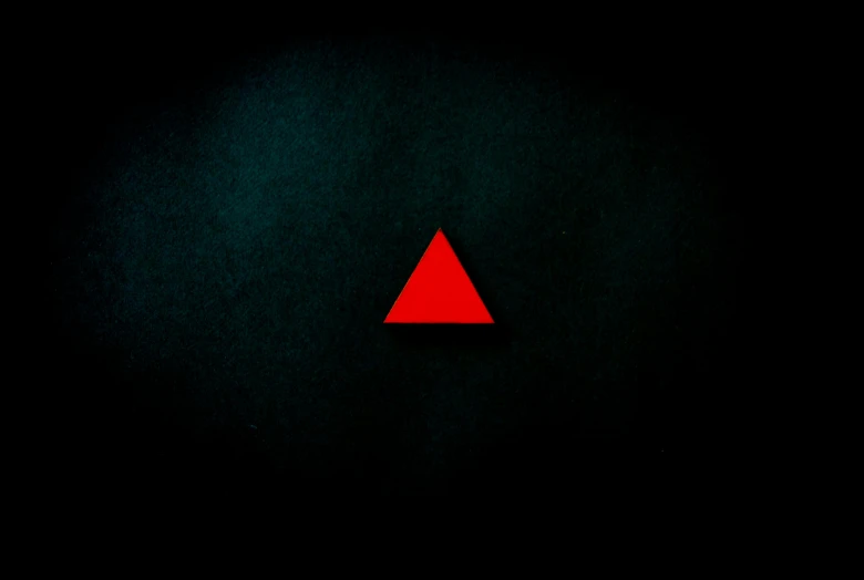 a red triangle on a black background, an album cover, unsplash, signs, red dot, threyda, found footage horror