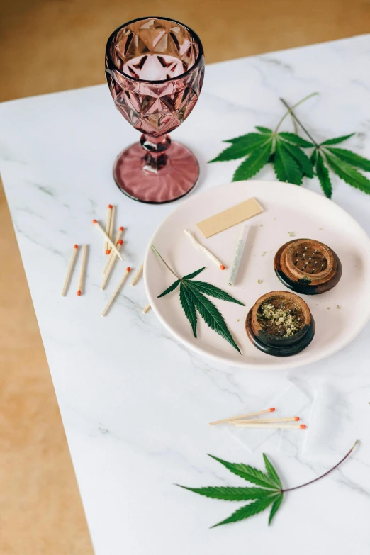 a close up of a plate of food on a table, 4 2 0, mixed materials, tabletop, buds