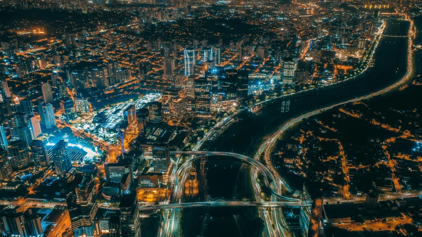 an aerial view of a city at night, pexels contest winner, hurufiyya, gif, georgic, vivid and detailed, instagram post