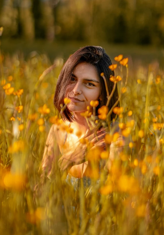 a woman sitting in a field of yellow flowers, inspired by Elsa Bleda, pexels contest winner, color field, halfbody headshot, indian girl with brown skin, backlight photo sample, medium format