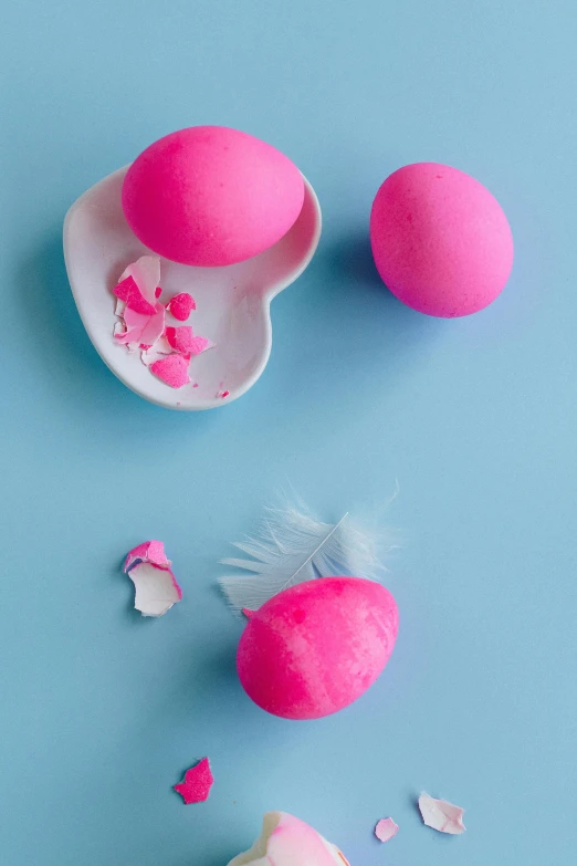 a pink egg sitting on top of a white plate, scattered props, exploded view, promo image, thumbnail
