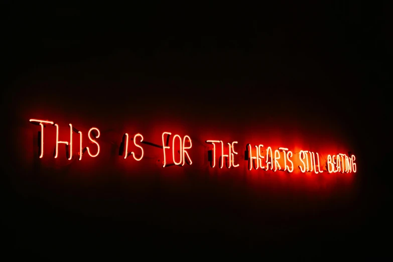 a neon sign that says this is for the arts and science department, an album cover, by Tracey Emin, pexels, real heart, christian saint, light smile, red neon