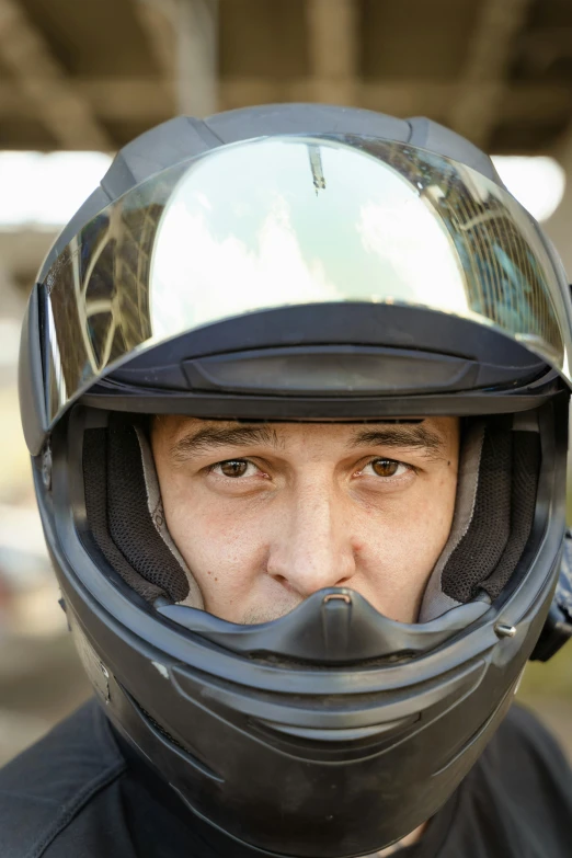 a close up of a person wearing a helmet, by Jason Felix, shutterstock, frontal portrait, a handsome, portrait”