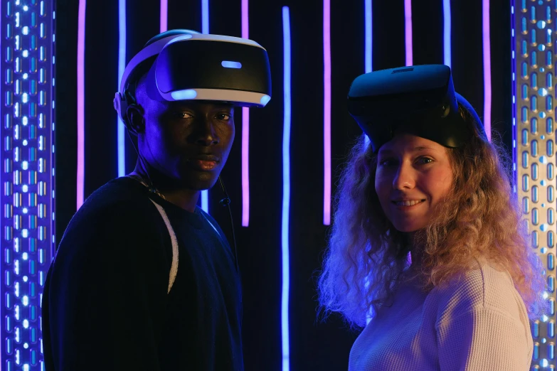 a man and a woman wearing virtual reality headsets, by Carey Morris, unsplash, interactive art, glowing visor, looking towards camera, epic 3 d omolu, various posed