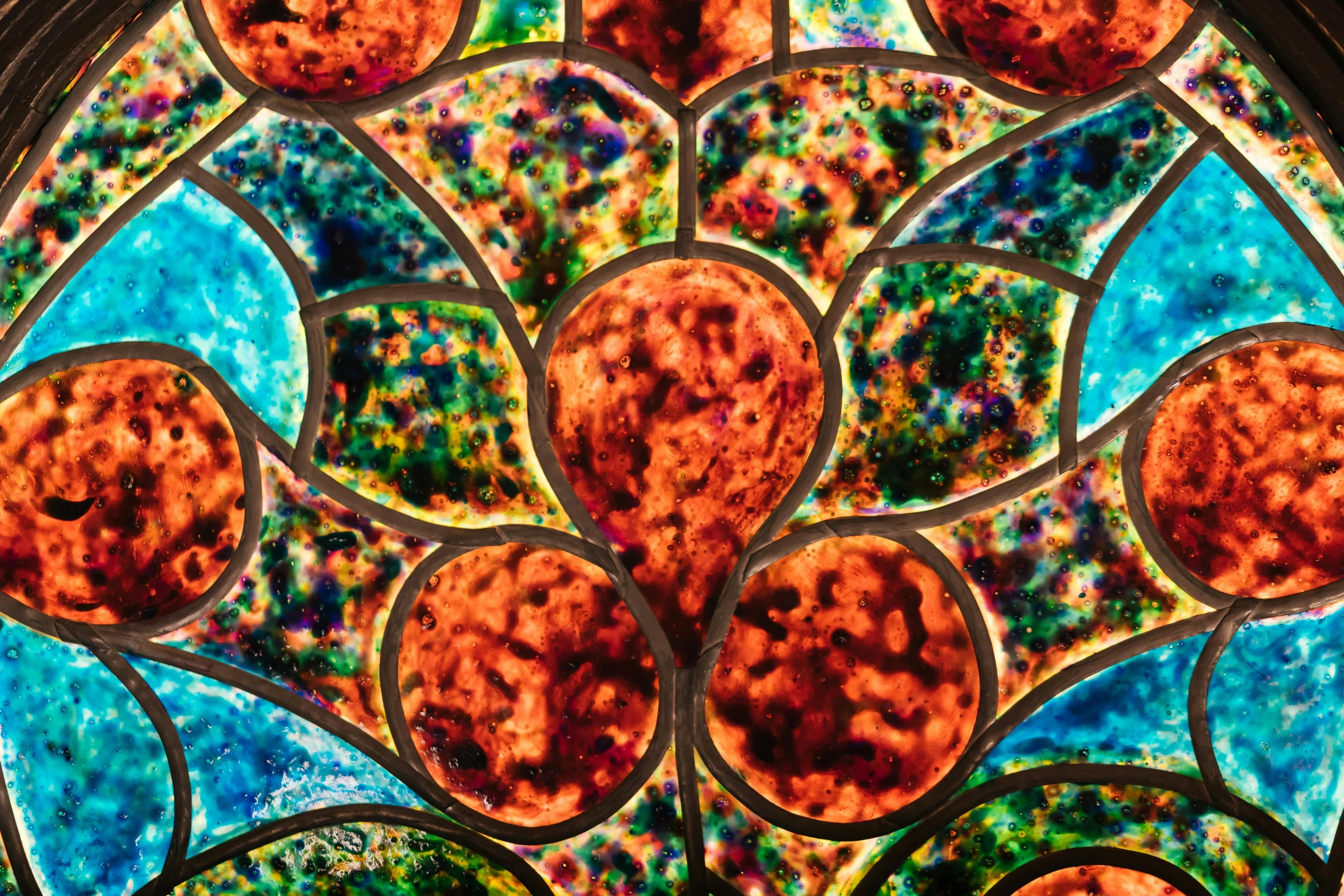 a close up of a stained glass window, inspired by Louis Comfort Tiffany, ornate with fiery explosions, detailed scales, philip taaffe, early 2 0 th century